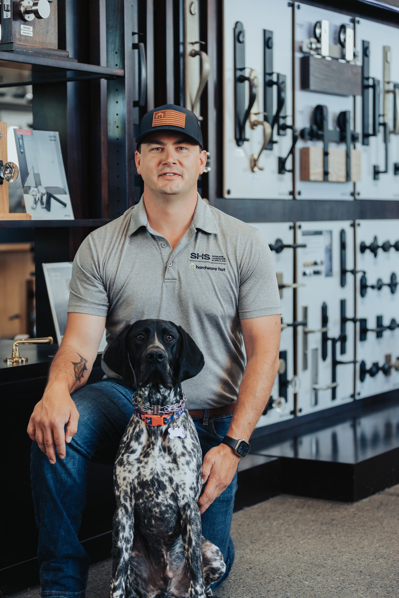 man with dog at hardware shop 